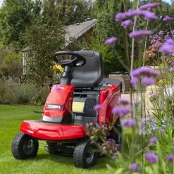 Cobra LT62HRL 24" Hydrostatic Rear Collect Ride-On Lawn Mower -Lawn Mower Shop colt62hrl lifestyle flowers
