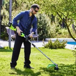 GreenWorks GD24X2TXK4X Split-Shaft 48V (2 X 24V) Cordless Grass Trimmer (with 2 X 4Ah Batteries & 2A Twin Charger) 19 GreenWorks GD24X2TXK4X Split-Shaft 48V (2 X 24V) Cordless Grass Trimmer (with 2 X 4Ah Batteries & 2A Twin Charger) -Lawn Mower Shop greenworks gd24x2tx brushcutter lifestyle 1